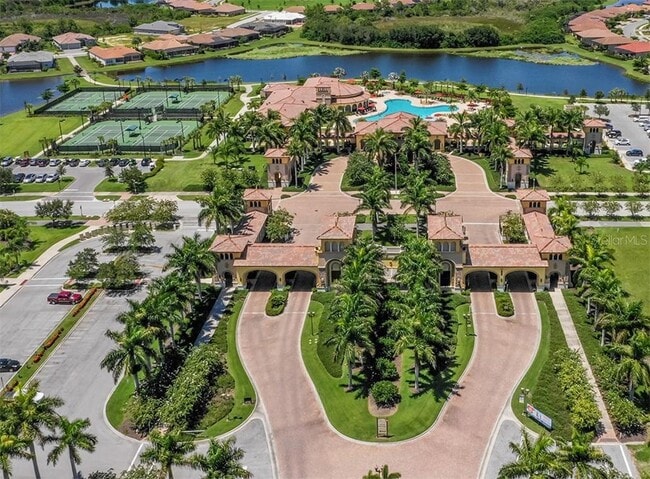 Building Photo - "Spacious 3-Bedroom Townhouse with Lake Views & Modern Finishes in Gran Paradiso"