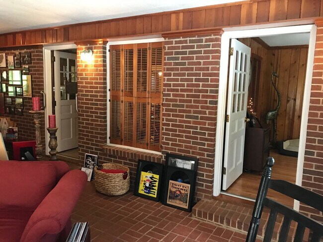 Building Photo - Charming 3BR Home Near Normaltown with Covered Porch & Hardwood Floors