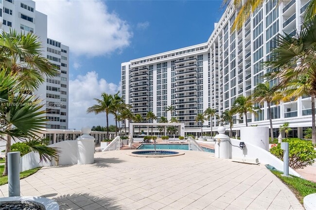 Building Photo - 10275 Collins Ave