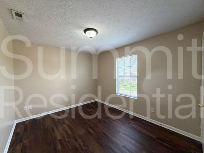 Building Photo - 8005 Harshaw Dr