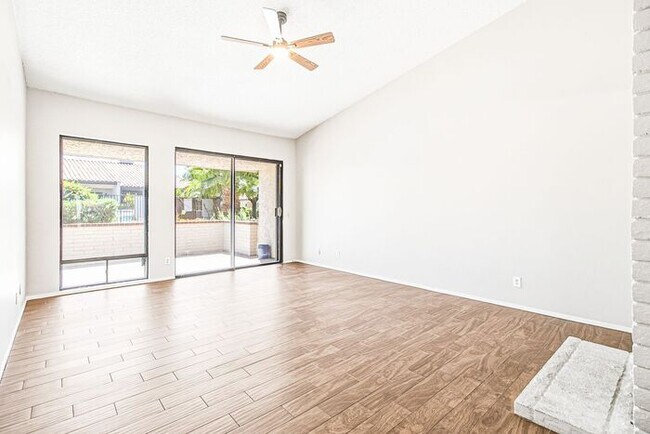 Building Photo - Gated 3-Bedroom Townhome with Fireplace, Patio & 2-Car Garage