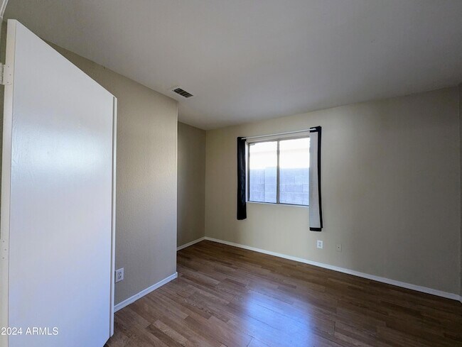 Building Photo - 7059 W Gardenia Ave