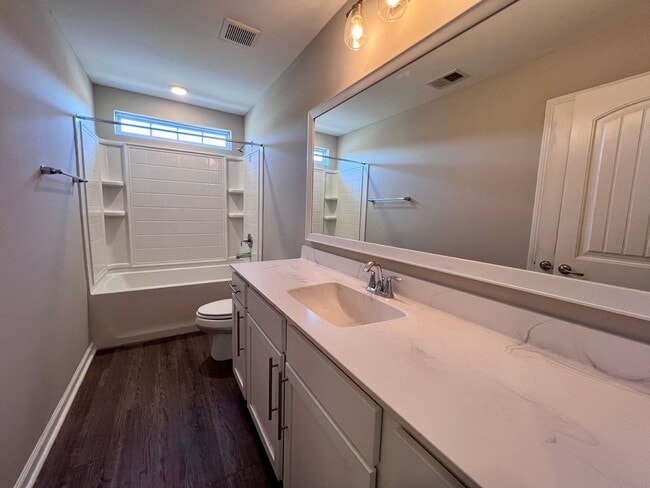 Building Photo - 3 bed/2.5 bath at end unit townhome in Berkeley Walk at Savannah Quarters with garage