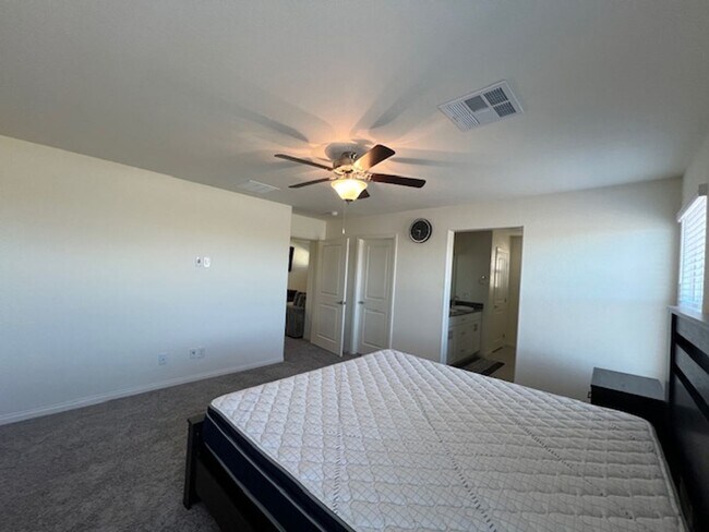 Building Photo - FULLY FURNISHED!!! beautiful 3 bedroom 2 and half bath home is located in the Symmetry Bay Cadenc...