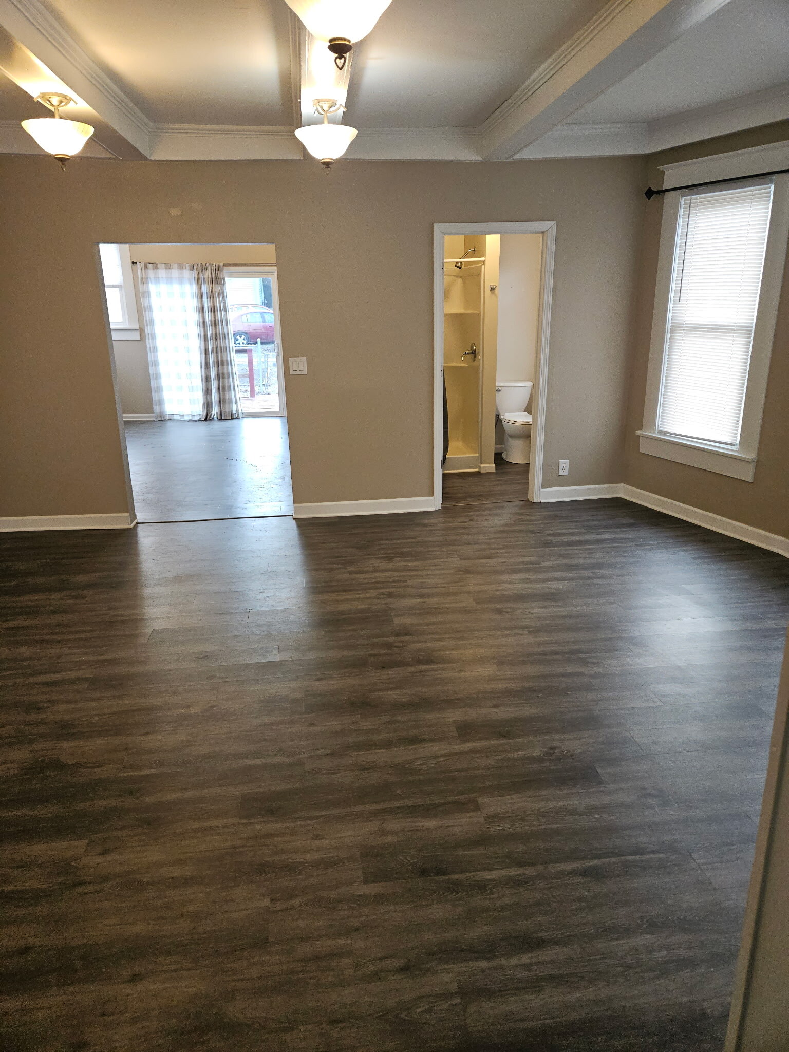 Dining looks into kitchen and main floor bath - 1214 5th Ave