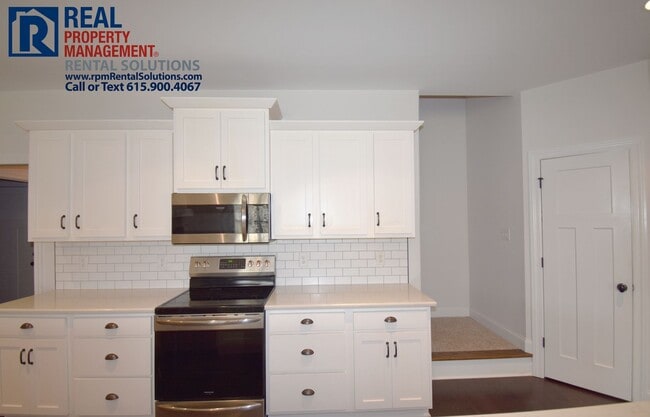 Building Photo - All brick 4 bedroom home plus Bonus room! Garage and covered patio!