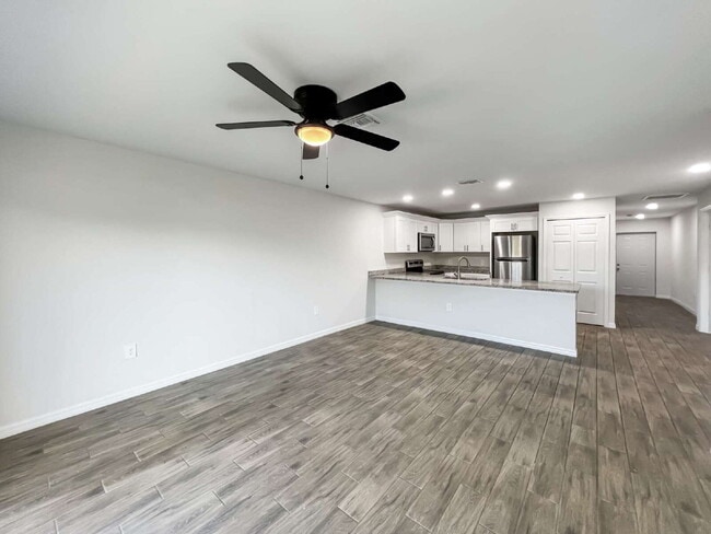 Building Photo - Move-In Special! Half Month FREE – APPLY by November 30th – Modern 3BR/2BA Duplex in Lehigh Acres...