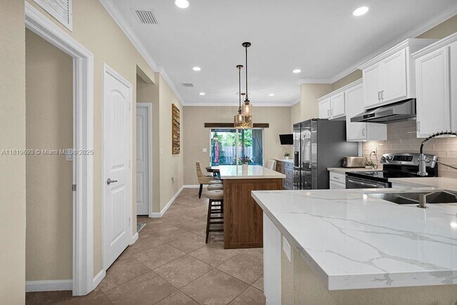 Building Photo - 8986 SW 214th Terrace