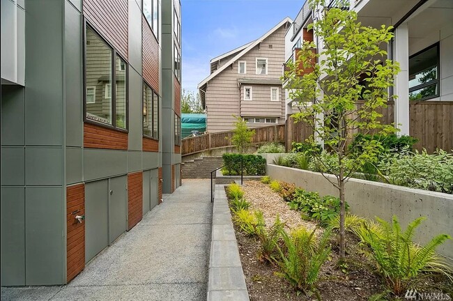 Entry walkway, front of building - 9268 50th Ave S