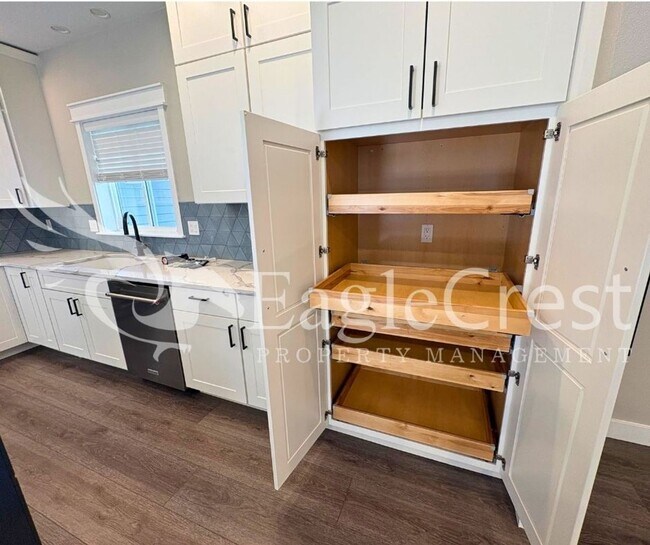 Building Photo - Contemporary Home With A Covered Patio & Quartz Countertops