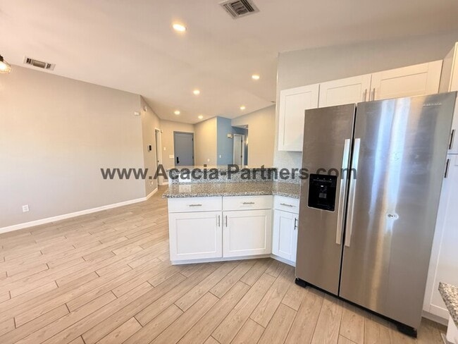 Building Photo - Three bedroom home with spacious great room