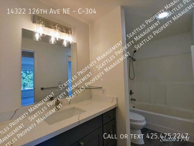 Building Photo - Top Floor 2 Bedroom Condo- with Vaulted Ce...
