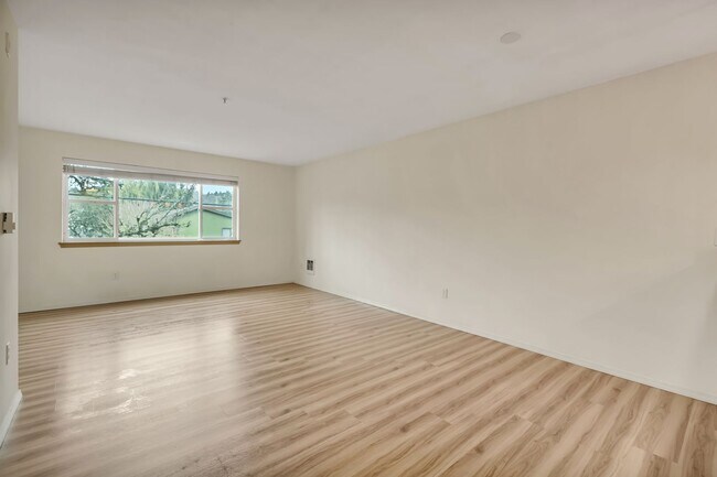 Building Photo - Two-Story Condo Near Delridge Library with Private Courtyard & Easy Downtown Access