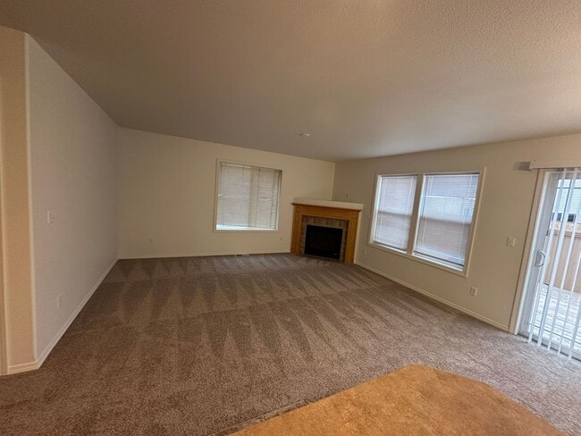 Building Photo - MOVE IN SPECIAL! Spacious 2 bed/2.5 bath with bonus room townhome off Road 68