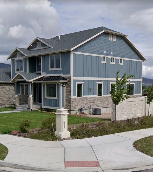 Apartment is around back and downstairs walk out - 936 W Temple Rim Ln