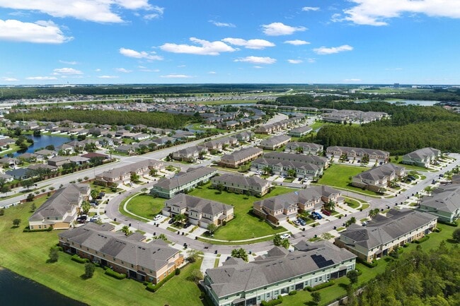 Building Photo - MOVE IN SPECIAL- 4/2.5 Town Home w/ Loft and Office in Harrington Pointe at Wyndham Lakes