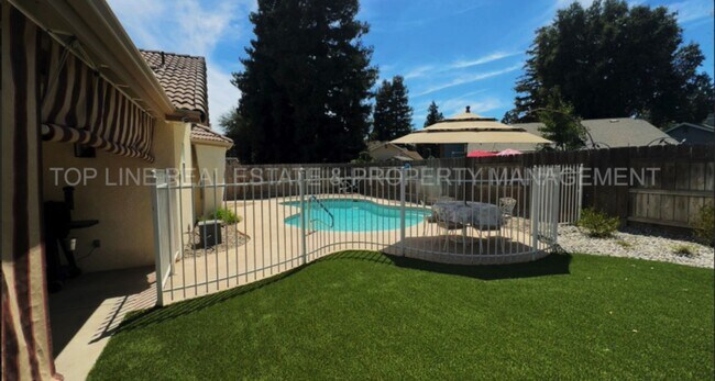 Building Photo - Fully Furnished Home with Pool – Prime Location in Visalia, CA
