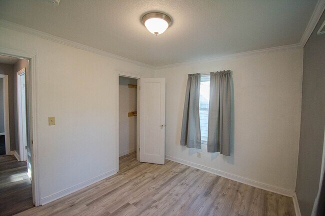 Building Photo - Fenced Yard, 2-Car Garage + Quiet Location!