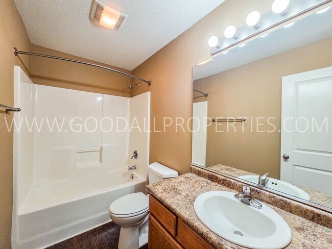 Building Photo - Bright & Spacious Waukee Townhome Near Dining, Shopping & Entertainment and attached 2-car garage