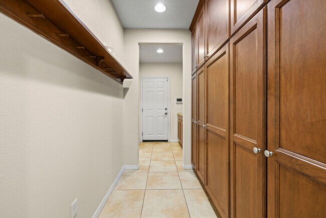 Building Photo - Luxurious 5-Bedroom Pool Home with Solar &...