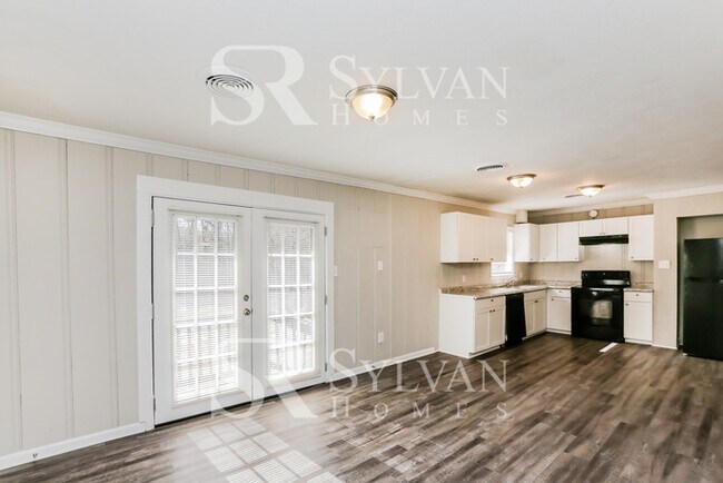 Building Photo - The living is easy in this 3 bedroom, 2 ba...