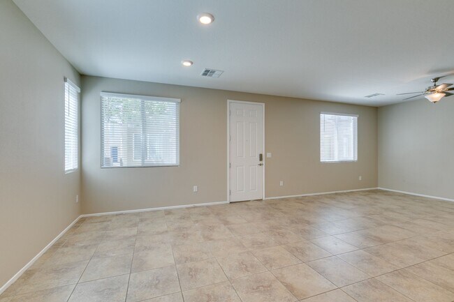 Building Photo - Spacious Townhouse with Loft & Rare 3-Car Garage!