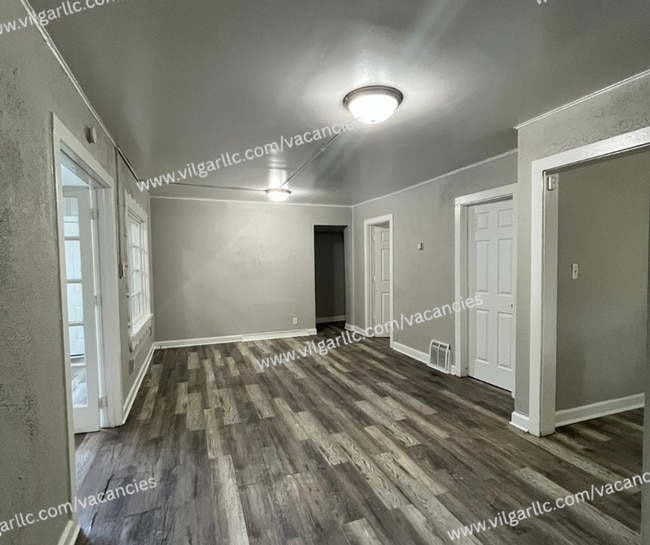Building Photo - 6065 E 6th Pl