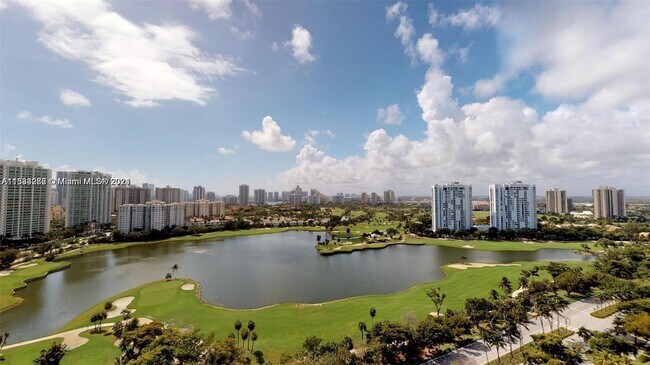 Building Photo - 3675 N Country Club Dr