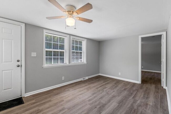 Building Photo - Updated Home with Hardwood Floors, LR & De...