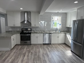 Building Photo - Fully Renovated Condo For Rent in West War...