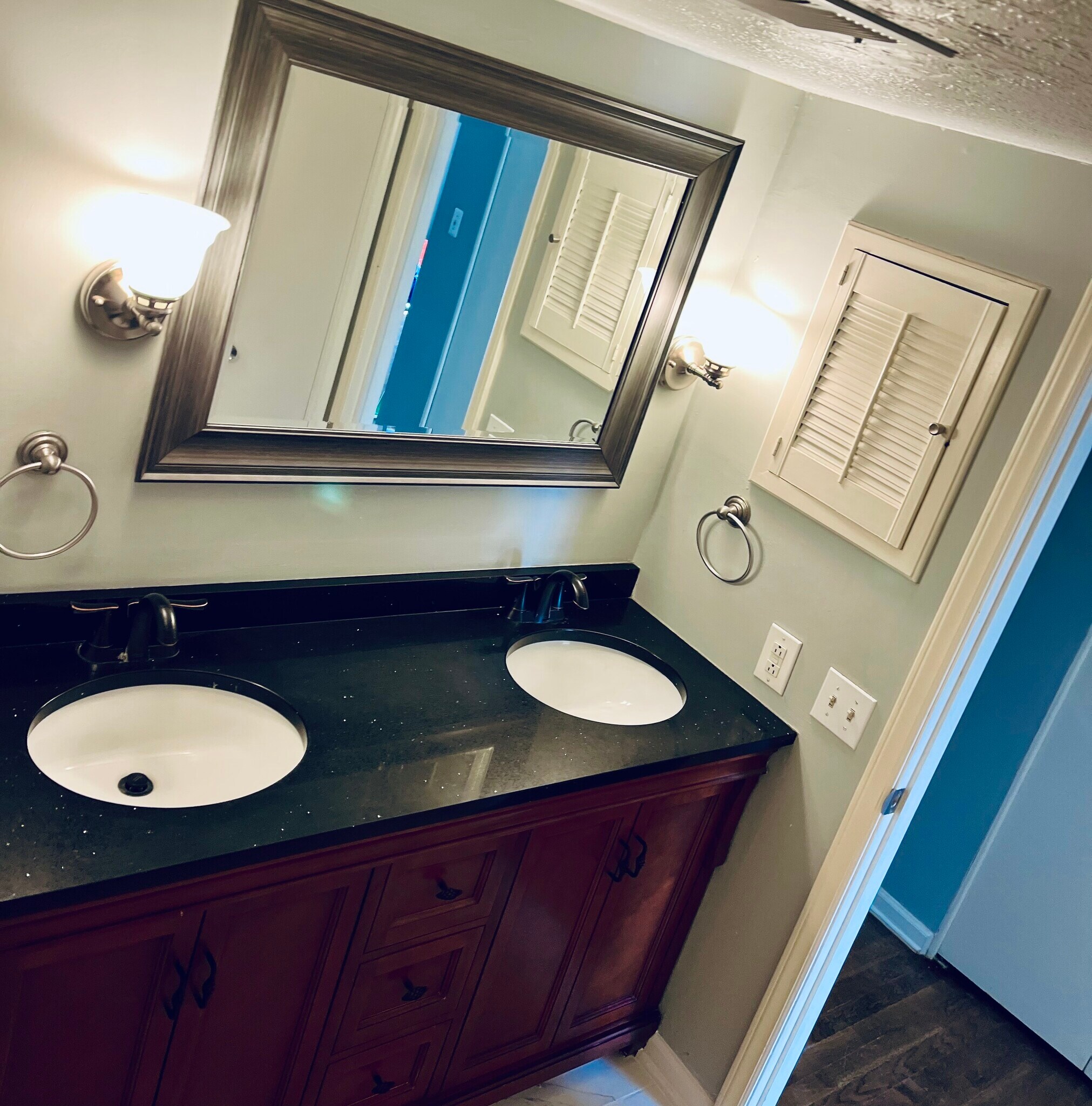 Updated bathroom with double vanity - 4426 Jarboe St