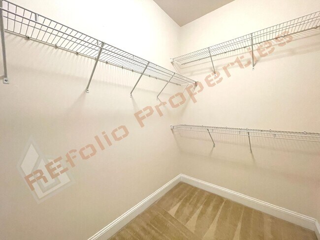 Building Photo - Beautiful 3 Story 3 Bedroom Townhouse with Huge 1st Floor Flex Space with Access to Patio + 2 Car...