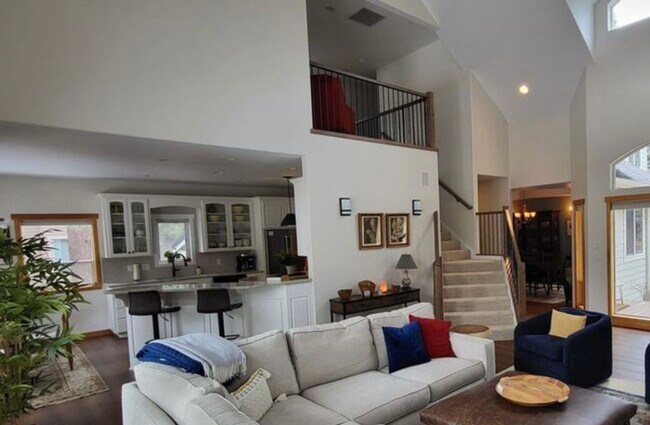 living room to kitchen - 60709 Golf Village Loop