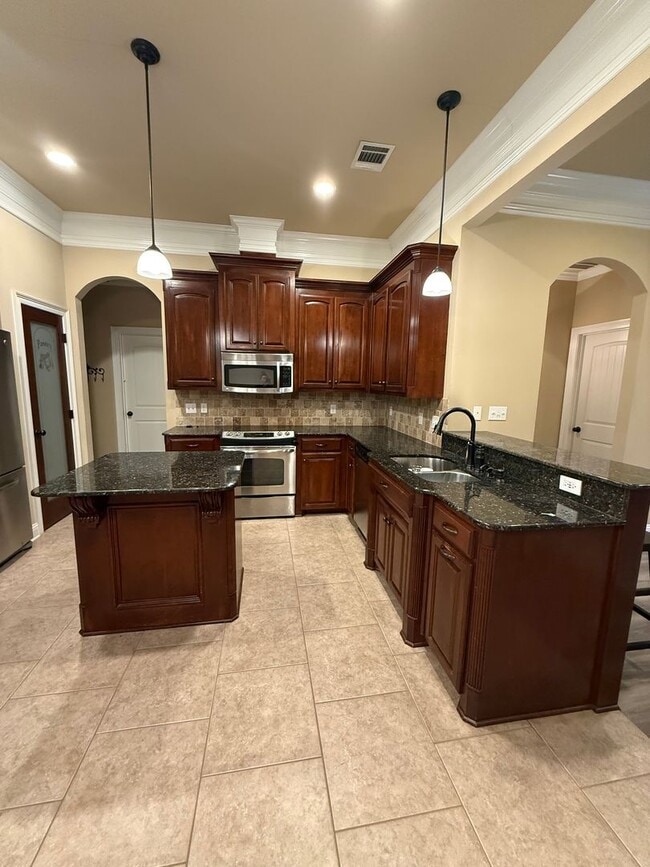 Building Photo - Haughton! Charming 3-Bedroom Brick Home with Spacious Yard