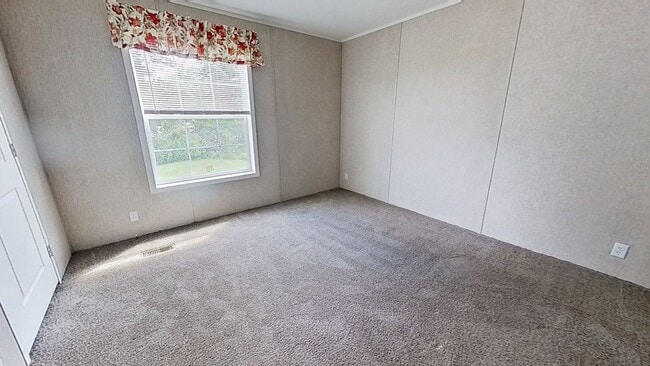 Building Photo - Move-In Ready Mobile Home with Upgrades!