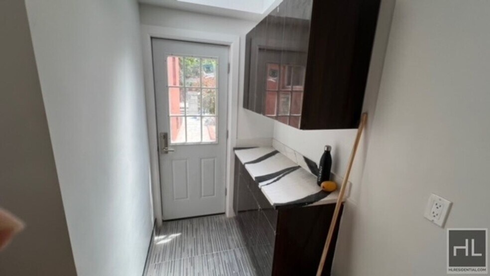 Building Photo - 100% GUT RENOVATED DUPLEX  with PRIVATE GA...