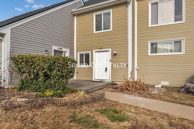 Building Photo - 403 Raintree Dr