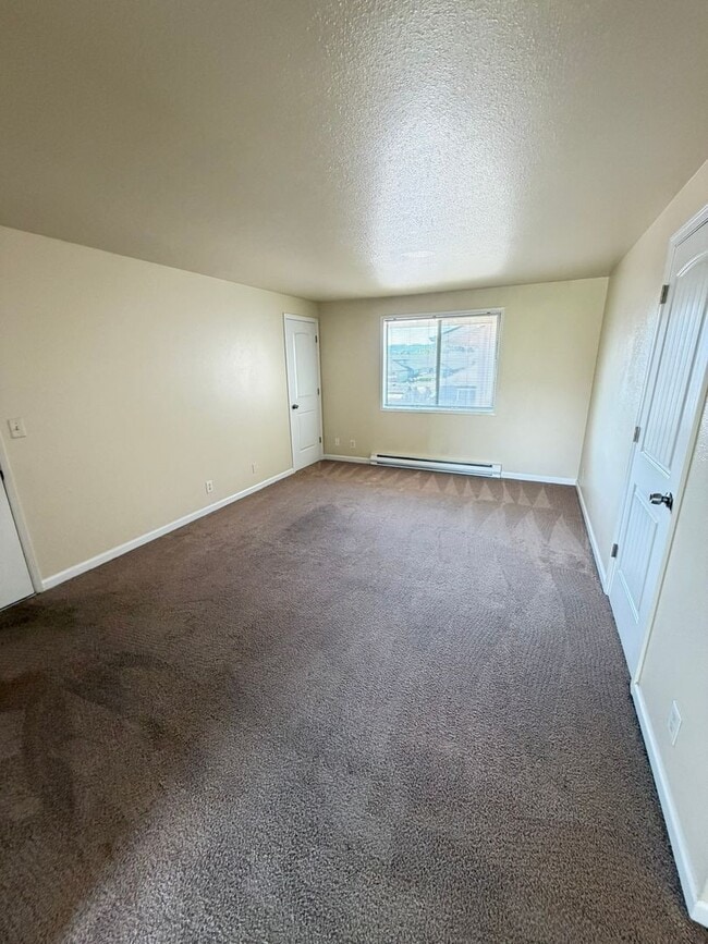 Building Photo - Recently Remodeled Two Bedroom Apartment With Canal Views and Private Balcony!