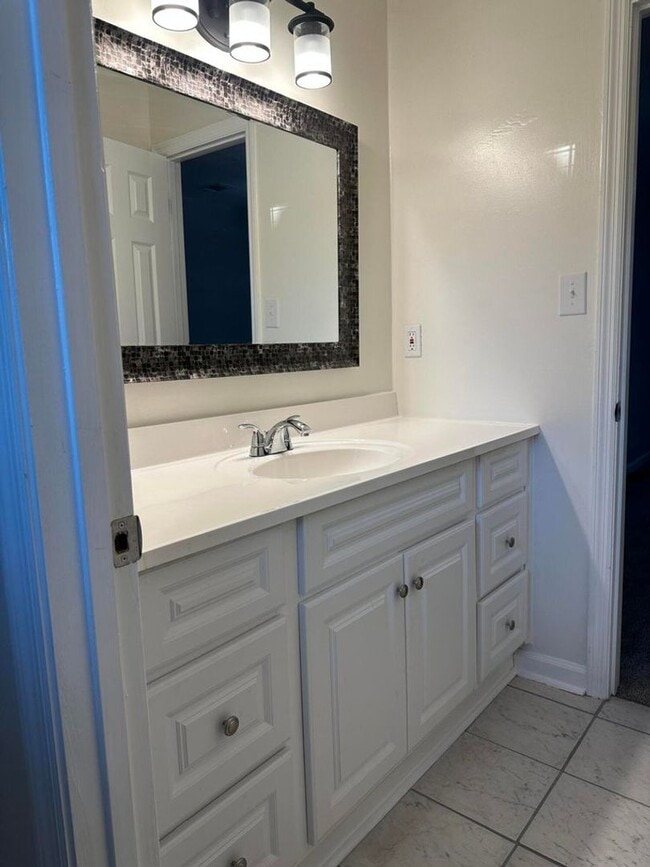 Building Photo - Move-In Ready Corner-Lot Home with Wraparound Porch Near Fort Eisenhower