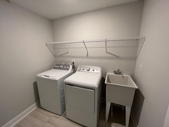Building Photo - Newly Built 4BD, 3BA Cary Townhome with Modern Amenities and Screened-In Patio