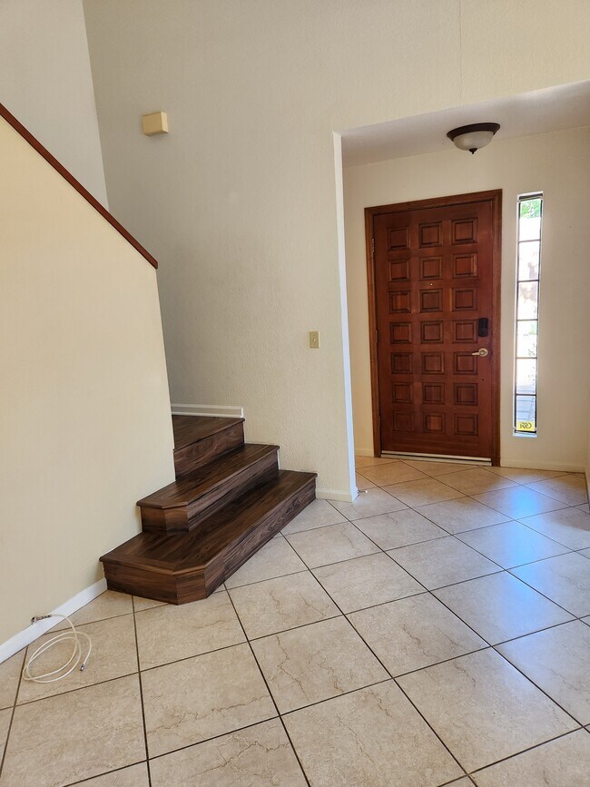 Living room towards stairs - 5640 E Bell Rd