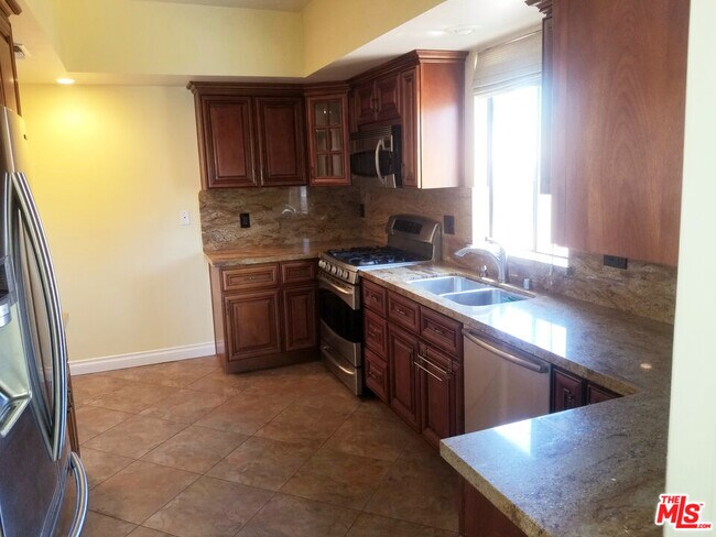 Building Photo - 10620 Eastborne Ave