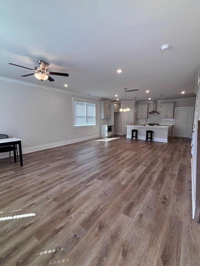 Building Photo - Brand new three-bedroom, 2.5-bath townhome