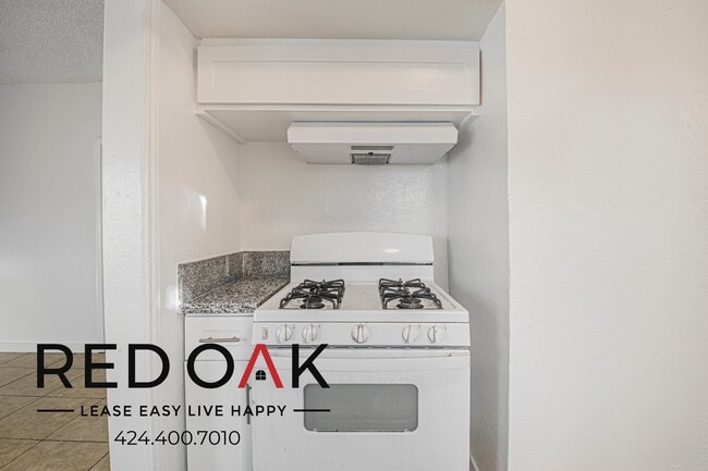 Building Photo - 7404 S Figueroa St