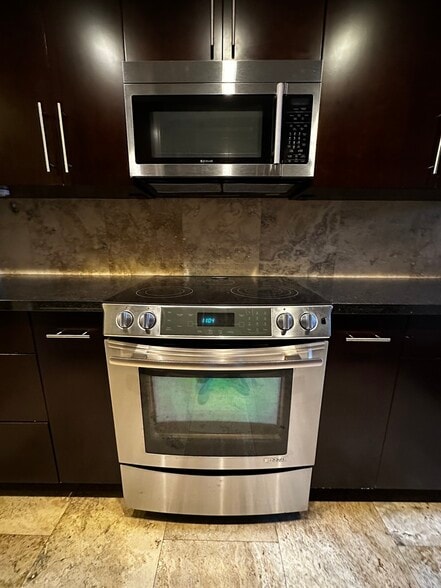 Jenn Air range, microwave and refridgerator - 11951 Mayfield Ave