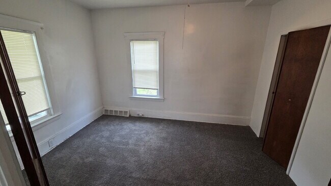 Building Photo - Spacious 1-Bed Duplex with French Doors to Master Bedroom