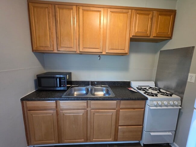 Building Photo - Spacious 1-Bedroom Duplex with Plenty of Kitchen Storage
