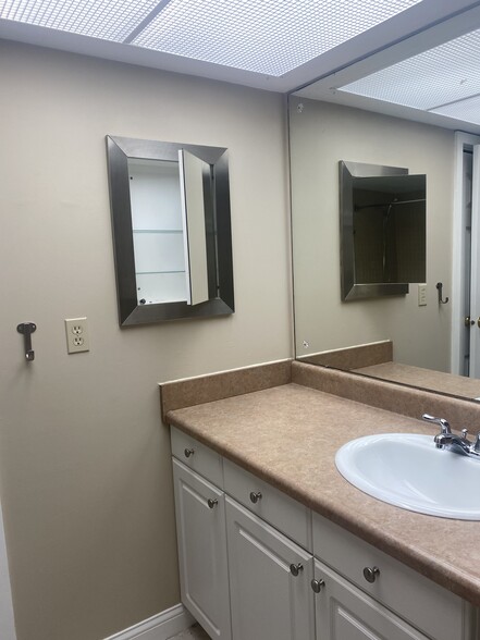 Sink with medicine cabinet - 105 E Ticonderoga Dr