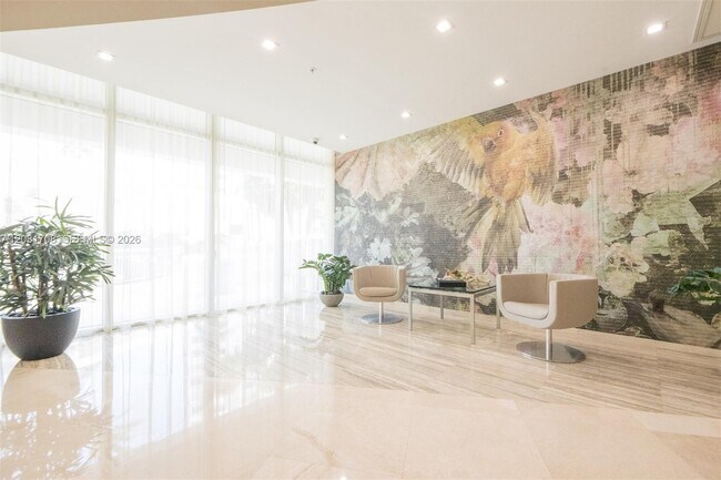 Building Photo - 10275 Collins Ave