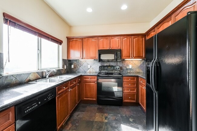 Building Photo - 3155 E 104th Ave